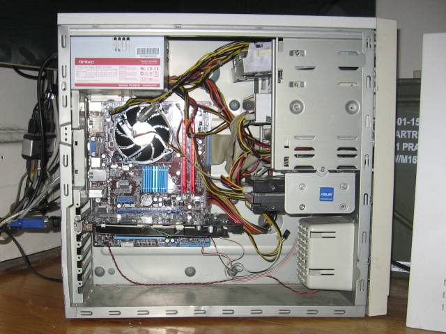 The computer set up neatly with all the wires and parts back in their place.