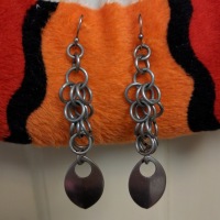 A pair of chainmaille scale earrings