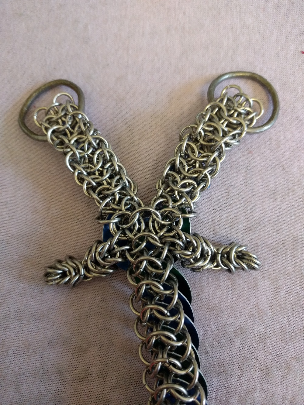 The underside of the neck of the two headed dragon, showing the chainmaille needed there.
