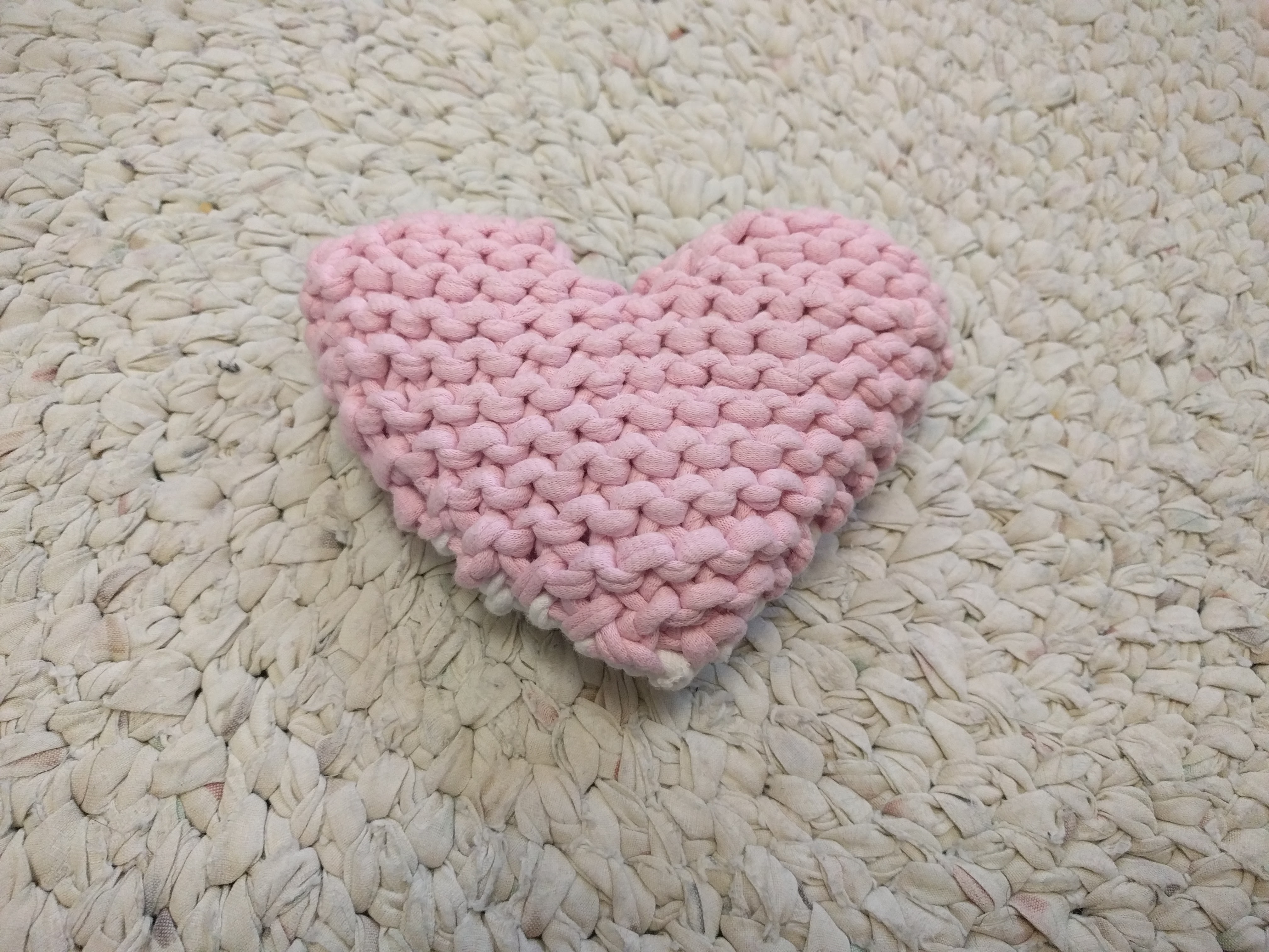 A pink knitted heart