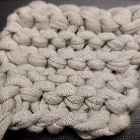A white knitted square