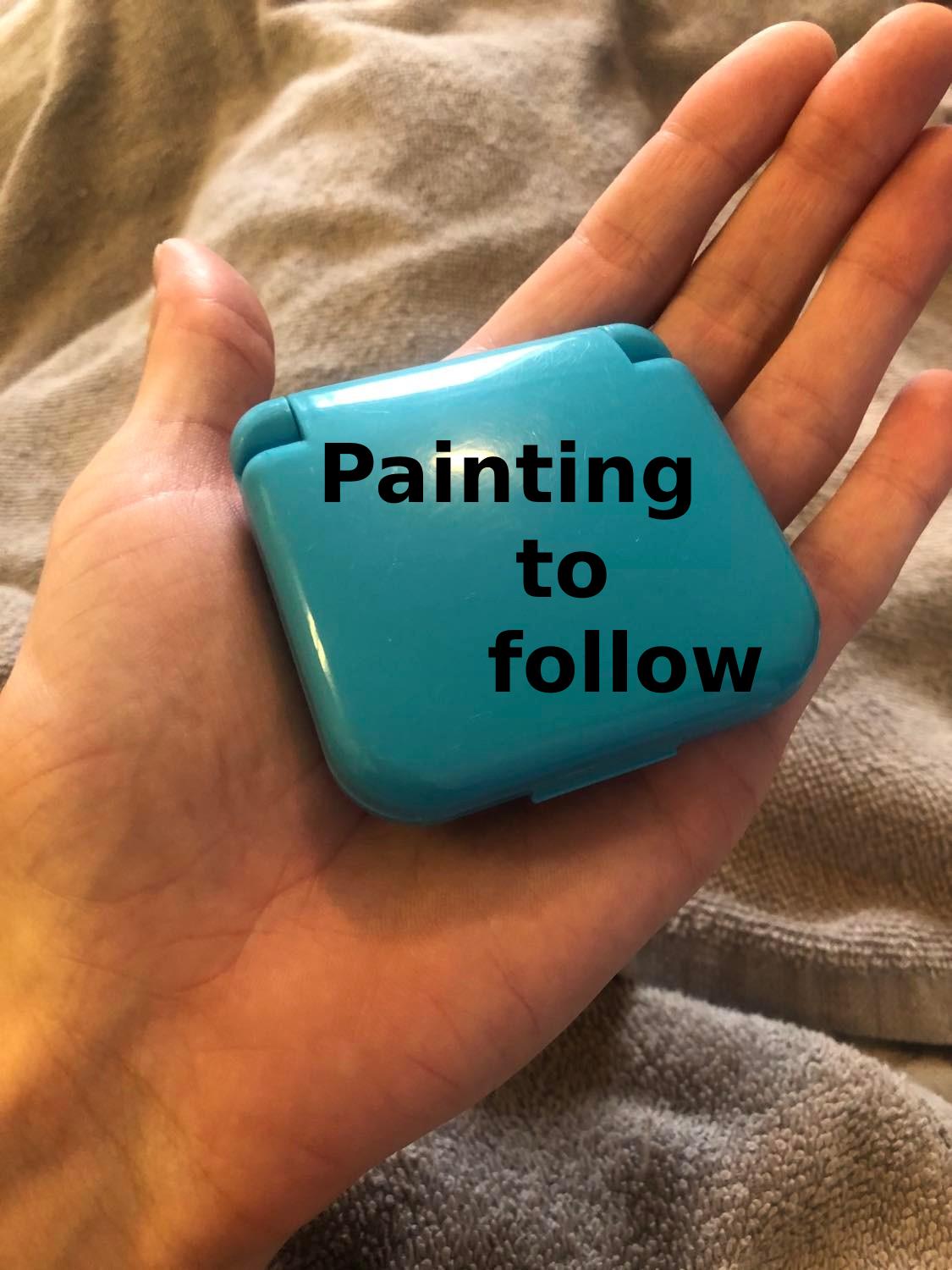 It says 'painting to follow' on top of that closed dice case picture.
