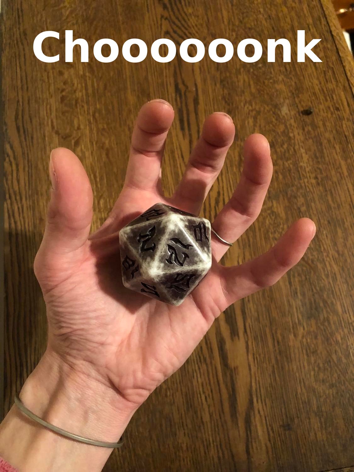 A giant chonk of a dice, chooooooonk