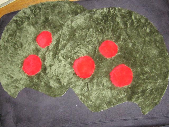 The two sides complete, with red orbs sewn in.