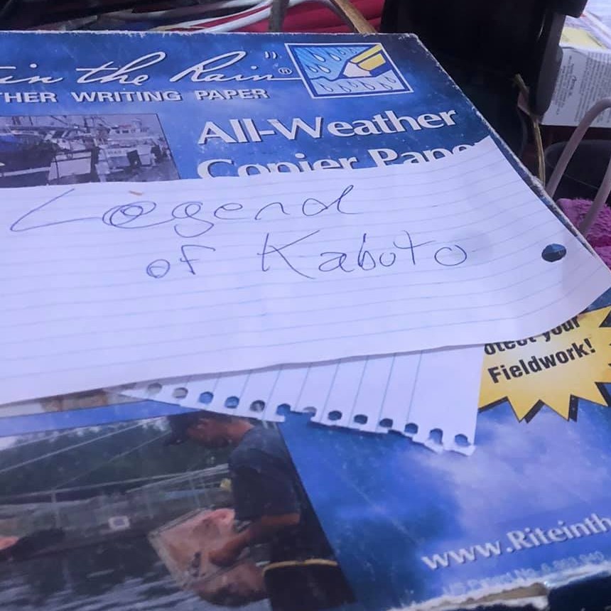 A box of all-weather paper, with the note 'Legend of Kabuto' written on loosleaf on top.