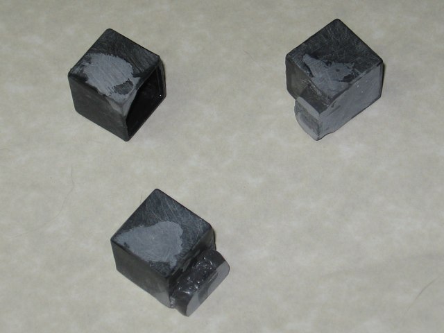 Three of the cubies, with the jb weld sanded down even with the sides and corners.